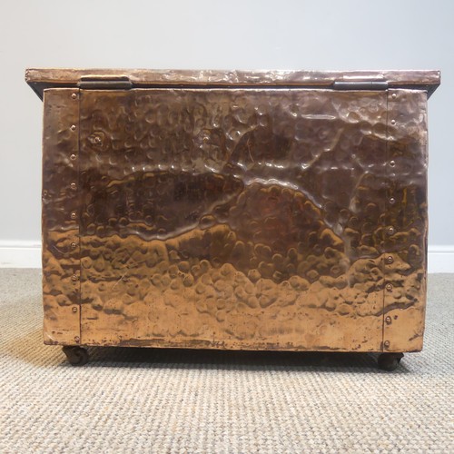 525 - An Arts and Crafts copper fireside / log Box, sloped hinge top with very large central cabochon / ru... 