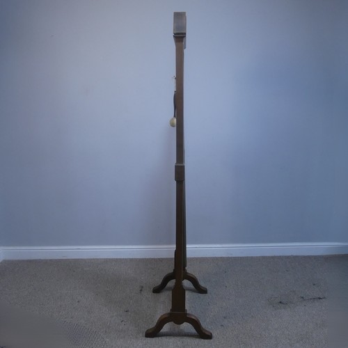 501 - An unusual large Arts and Crafts oak framed floor standing Chime / Gong, chimining on eight cylindri... 