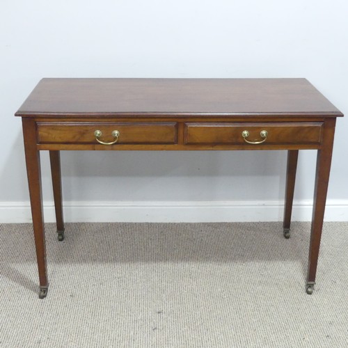 574 - An Edwardian mahogany writing / side Table by Maple & Co, right side drawer stamped 'Maple &... 