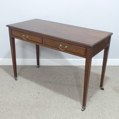 574 - An Edwardian mahogany writing / side Table by Maple & Co, right side drawer stamped 'Maple &... 