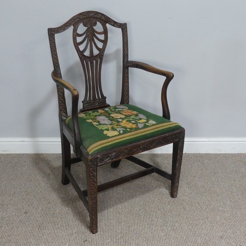 581 - A Georgian elbow Chair, with carved and pierced slat back and tapestry seat.