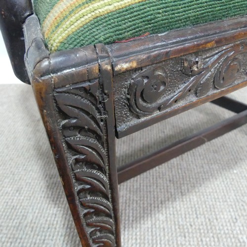 581 - A Georgian elbow Chair, with carved and pierced slat back and tapestry seat.