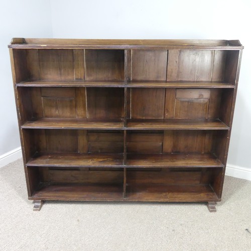 459 - An antique stained pine open Bookcase, top with three quarter gallery, over six open shelves, W 145 ... 