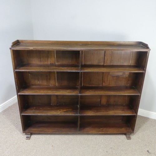 459 - An antique stained pine open Bookcase, top with three quarter gallery, over six open shelves, W 145 ... 