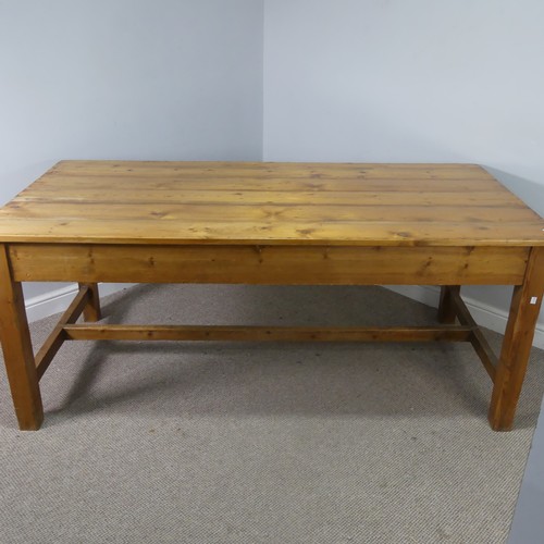 478 - An early 20th century pitch pine Farmhouse Kitchen refectory Table, six planked top raised on square... 