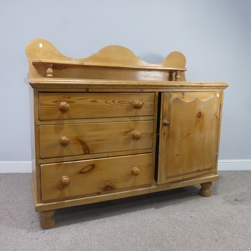 481 - A Victorian pine 'Lincolnshire' Dresser, moulded top over three drawers and cupboard door, raised on... 