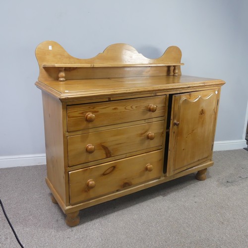 481 - A Victorian pine 'Lincolnshire' Dresser, moulded top over three drawers and cupboard door, raised on... 