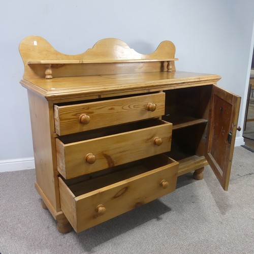 481 - A Victorian pine 'Lincolnshire' Dresser, moulded top over three drawers and cupboard door, raised on... 