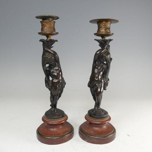 375 - A pair of French probably 19th century gilt and bronze figural Candlesticks, each featuring a maiden... 