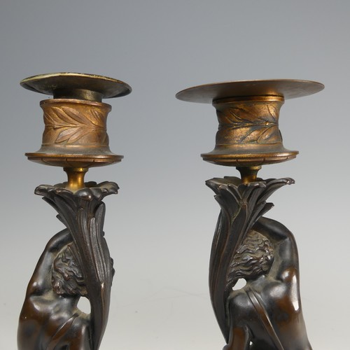 375 - A pair of French probably 19th century gilt and bronze figural Candlesticks, each featuring a maiden... 