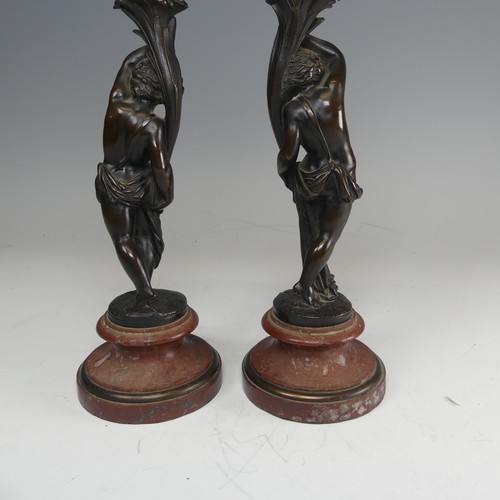 375 - A pair of French probably 19th century gilt and bronze figural Candlesticks, each featuring a maiden... 