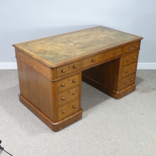 496 - A good late 19th century oak twin pedestal Desk, rectangular top inset with gilt tooled leather skiv... 