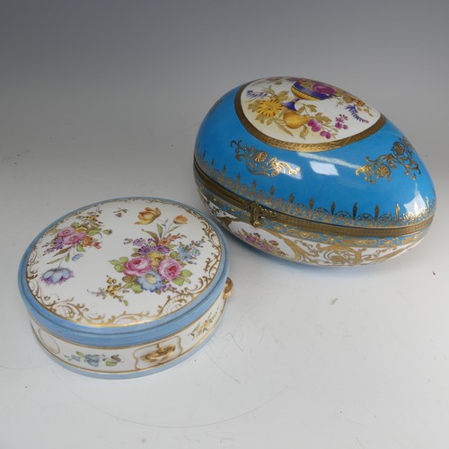 374 - A continental porcelain Sevres style egg shaped Box, blue ground with gilt metal mount, decorated wi... 