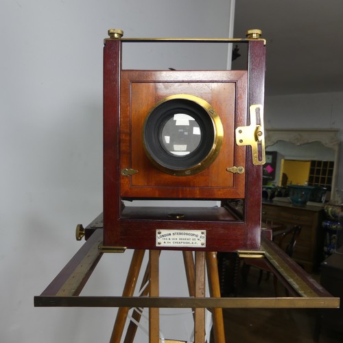 178 - A London Stereoscopic Co. Folding Studio Plate Camera, mahogany and brass with leather bellows and a... 