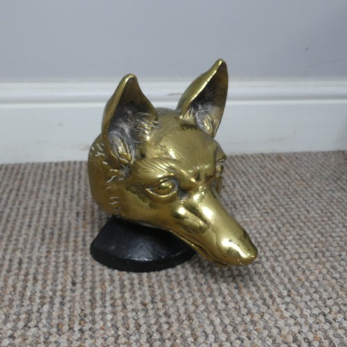 426 - An antique brass doorstop in the form of a Fox / Wolf, H 18 cm.