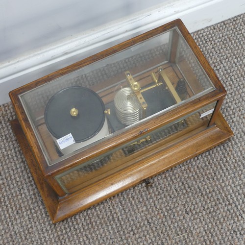 386 - An early 20th century Barograph, the oak case with bevelled glass and chart drawer, W 36 cm x H 20 c... 