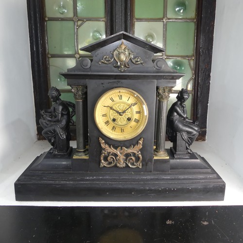 383 - A large Victorian slate mantle Clock by Howell & James Ltd, with metal garnitures to either side... 