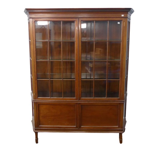 504 - A large Edwardian mahogany inlaid glazed display Cabinet, moulded geometric cornice above two glazed... 