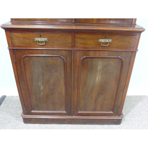 484 - A Victorian mahogany glazed Bookcase, moulded cornice over glazed doors and three adjustable shelves... 