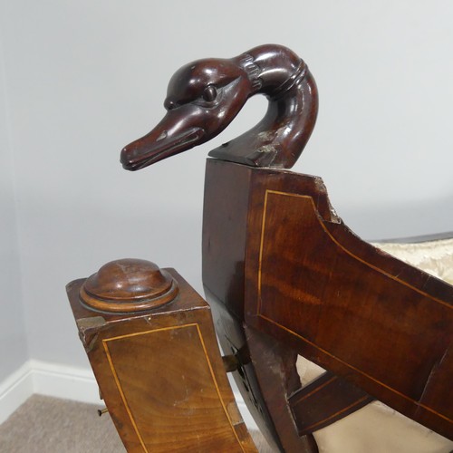 428 - An unusual Regency mahogany swing Cradle / Crib, circa 1820, of navette form with slatted sides and ... 