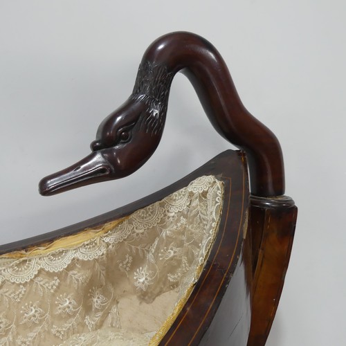 428 - An unusual Regency mahogany swing Cradle / Crib, circa 1820, of navette form with slatted sides and ... 