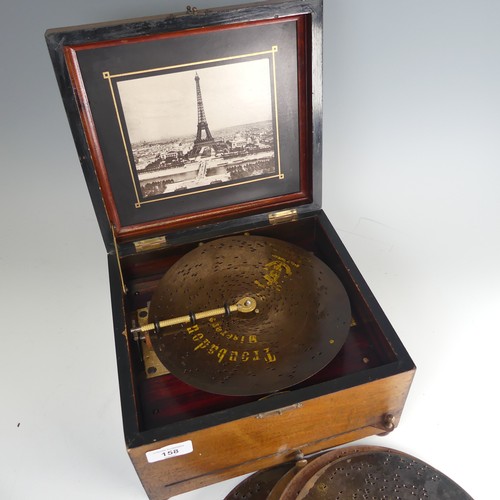 158 - A late 19th century walnut cased Polyphon, with decorative hinged lid, the inside lid with photograp... 