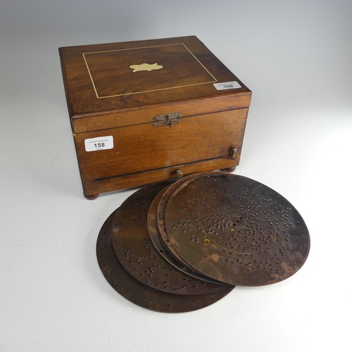 158 - A late 19th century walnut cased Polyphon, with decorative hinged lid, the inside lid with photograp... 