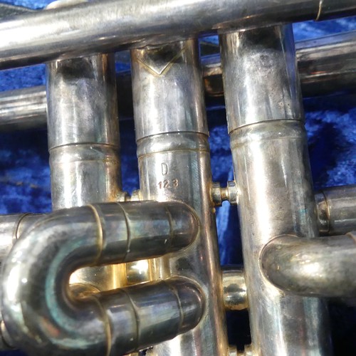 294 - A 'B & M, Champion' silver plated Trumpet, with mouthpiece and stamped 'D123', in fitted hard ca... 