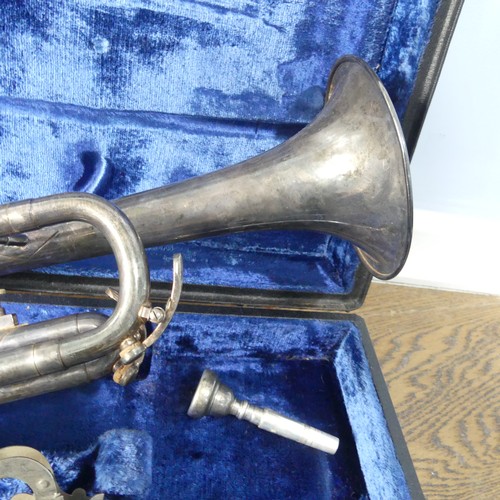 294 - A 'B & M, Champion' silver plated Trumpet, with mouthpiece and stamped 'D123', in fitted hard ca... 