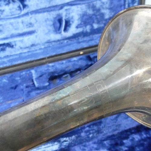 294 - A 'B & M, Champion' silver plated Trumpet, with mouthpiece and stamped 'D123', in fitted hard ca... 