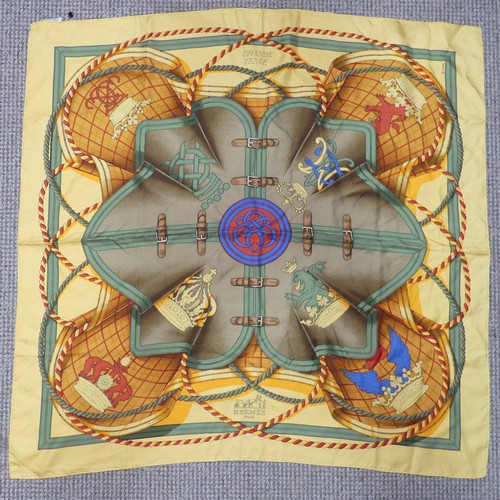 308 - A Hermès silk twill scarf: 'Grande Tenue', designed by Henri d'Origny, on light orange ground, hand ... 