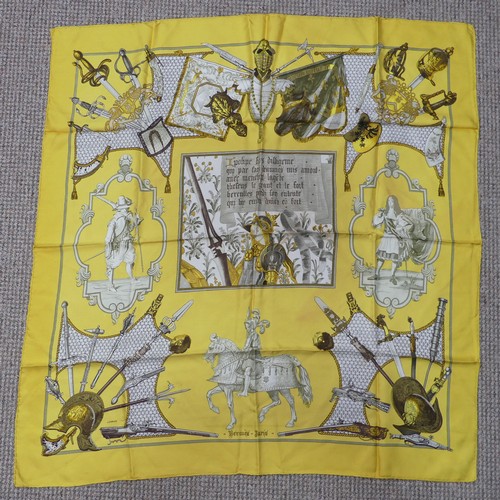 309 - Two Hermès silk twill scarves: 'Springs', together with another, Gladiator style design on yellow gr... 