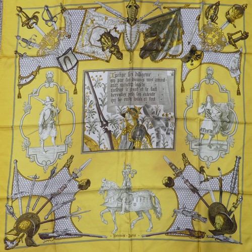 309 - Two Hermès silk twill scarves: 'Springs', together with another, Gladiator style design on yellow gr... 