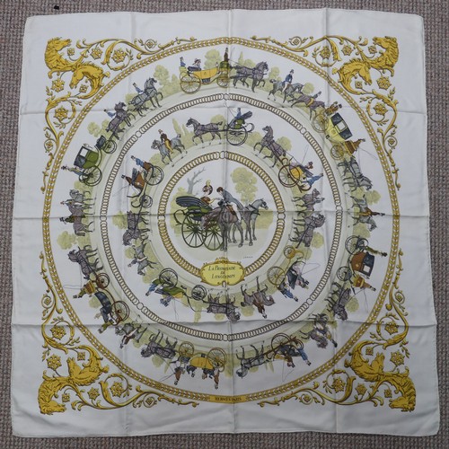 319 - A Hermès silk twill scarf: 'La Promenade De Longchamps', designed by Philippe Ledoux, on cream groun... 