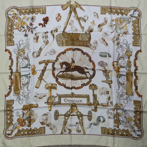 320 - Two Hermès silk twill scarves: 'The Bull & Mouth, Regents Circus Picadilly', cream ground with b... 