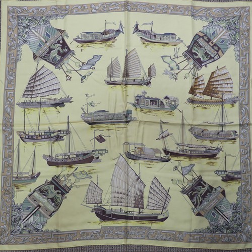 323 - Two Hermès silk twill scarves: 'Junques et Sampans', lemon ground, designed by Francoise de la Perri... 