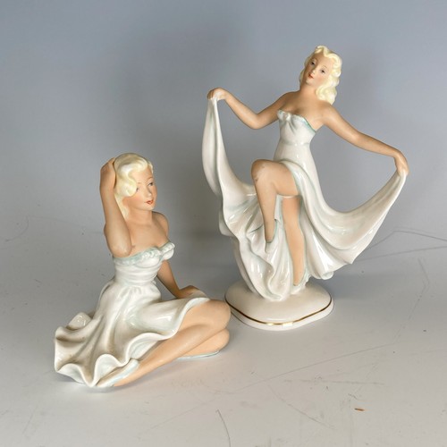 180 - Marilyn Monroe interest: two Schaubach Kunst porcelain figurines of Marilyn Monroe, one seated, 12cm... 