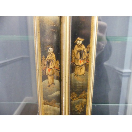 546 - An early 20th century Chinoiserie display Cabinet, black lacquered with gilt painted decorations, tw... 