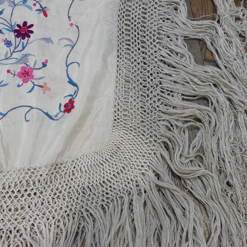 464 - An early 20th century silk embroidered Cantonese Piano Shawl, the cream ground with bright flowers a... 