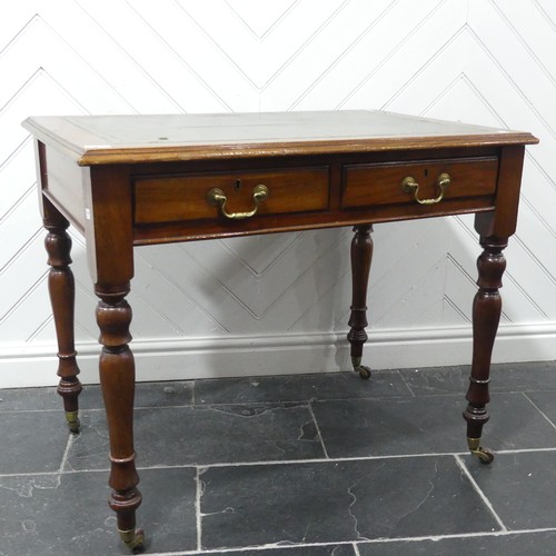 472 - A Victorian mahogany Writing Table, moulded top inset with gilt tooled leather writing surface, abov... 