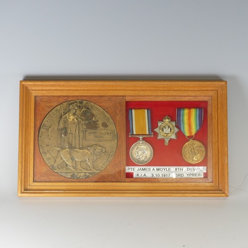 223 - A WW1 Devonshire memorial Plaque 'Death Penny', awarded to the family of 'James Arthur Moyle' K.I.A.... 