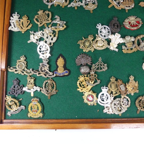 228 - A large quantity of approximately 250 WW1, WW2 and later Cap Badges, including ; 60th King's Royal R... 