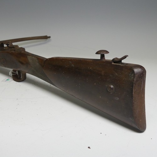 219 - An antique probably late 18th/early 19th century Crossbow, with wooden stock and textured grip, stee... 