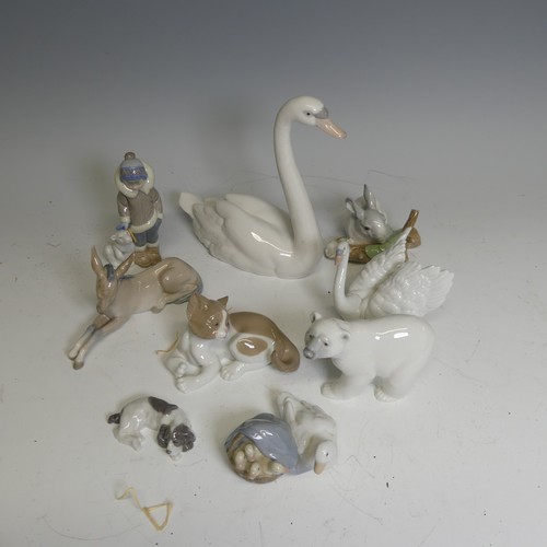 371 - A quantity of nine boxed Lladro Figures, including; Polar Bear No. 1207, Swan No. 5230, Rabbit Eatin... 