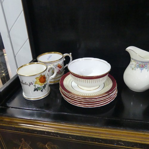 369 - A 19th century Staffordshire part tea set, comprising teapot, sugar basin and cream jug with sixteen... 