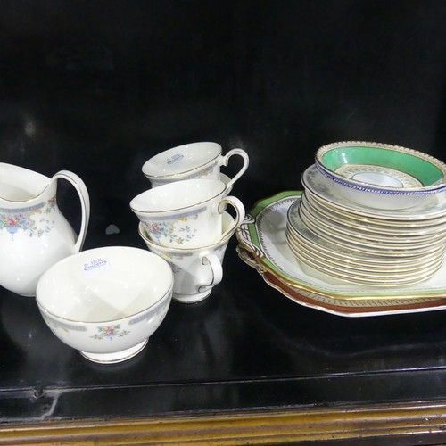 369 - A 19th century Staffordshire part tea set, comprising teapot, sugar basin and cream jug with sixteen... 