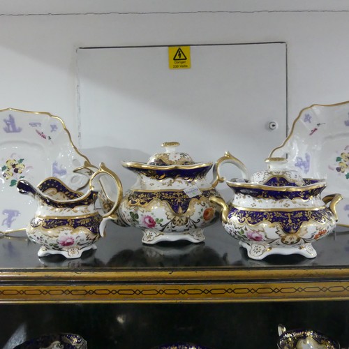 369 - A 19th century Staffordshire part tea set, comprising teapot, sugar basin and cream jug with sixteen... 