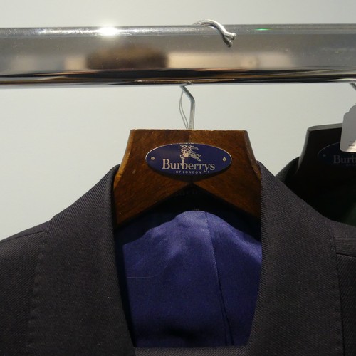 326 - A Burberrys' of London double breasted navy Suit, with trousers, ''38 chest, ''36 waist, ''22 sleeve... 