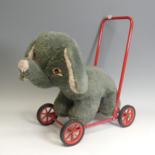 148 - A vintage The Deans / Gwentoy Group push along plush elephant Toy, the handle 52cm high, together wi... 