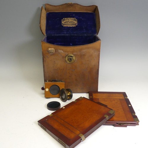 178 - A London Stereoscopic Co. Folding Studio Plate Camera, mahogany and brass with leather bellows and a... 